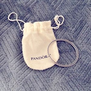 Beautiful Pandora sterling silver bangle bracelet, with heart filigree detail